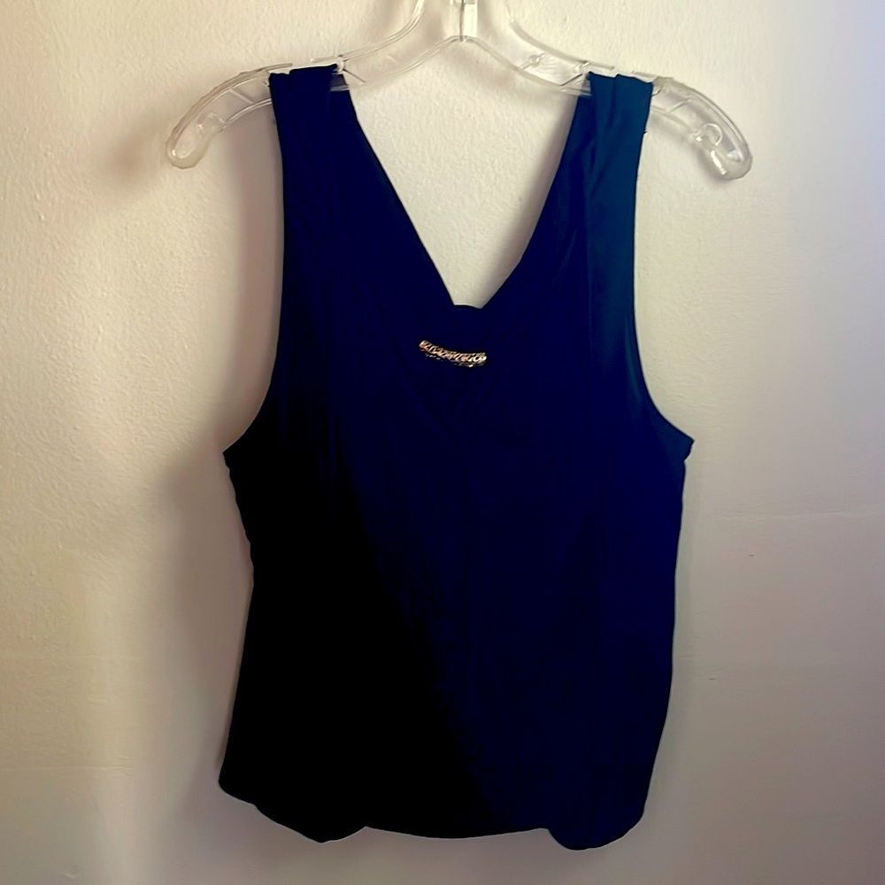 Tolula Blouse.So L, Black with gold embellishment on neckline and 2 single ties